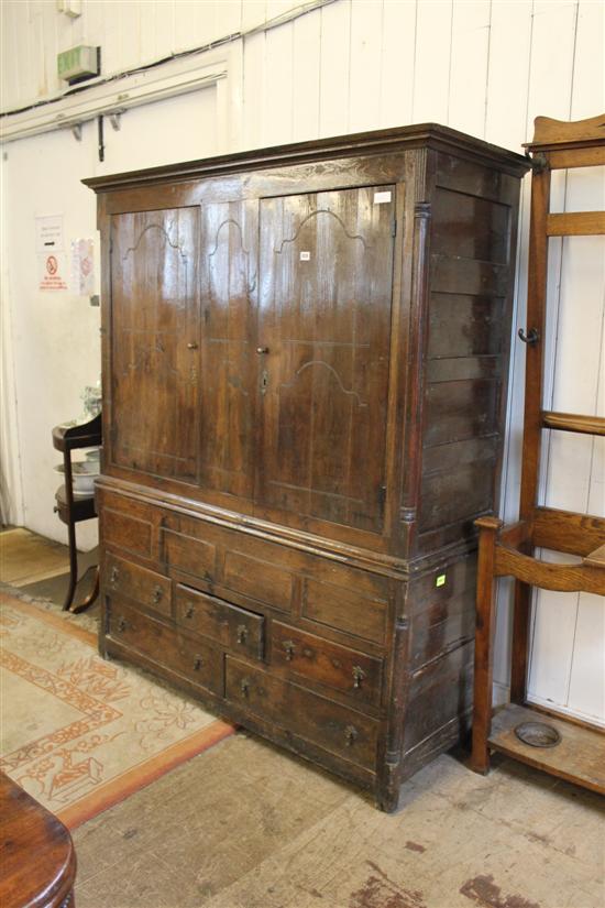 Early Oak wardrobe with drawers under